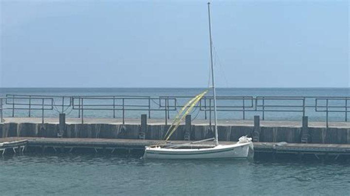 Dramatic Aftermath: Boat Capsizes In Treacherous Lake Michigan Waters
