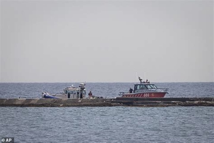 Lake Michigan Boat Disaster: Capsized Vessel Leaves Survivors Stranded